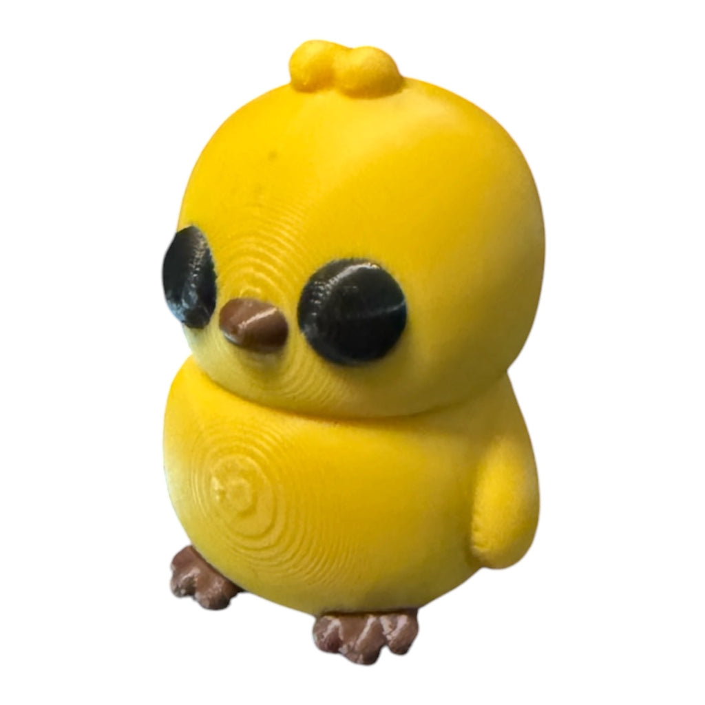 Driftwood 3D Printworks Flexi Chick toy, flexible and colorful plastic animal figure, perfect for kids and collectors.