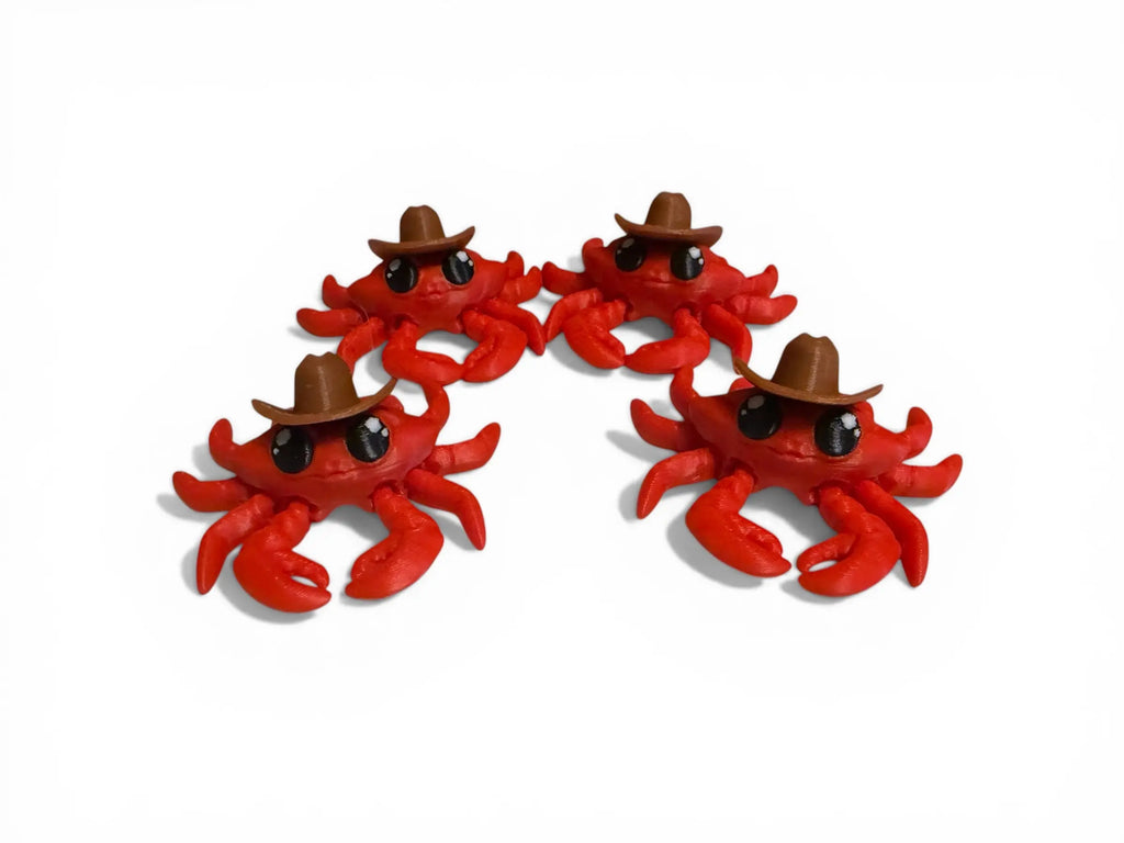 Four red crab figurines with brown hats on a white background