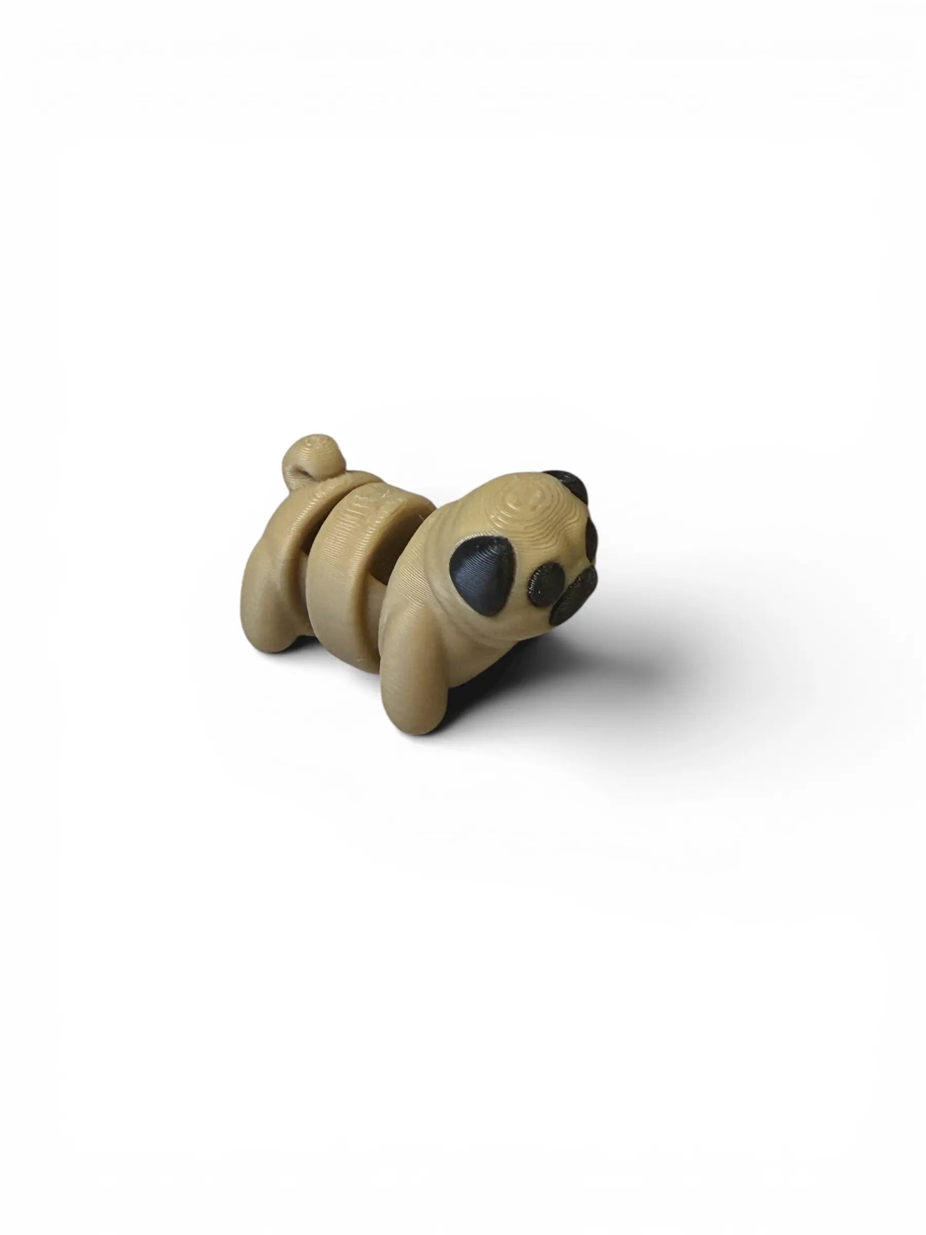 Beige flexi pug with black accents on a white background