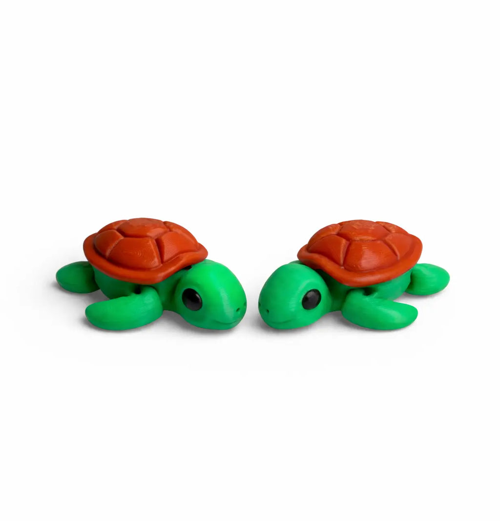 Flexi turtle with green body and brown shell on a white background