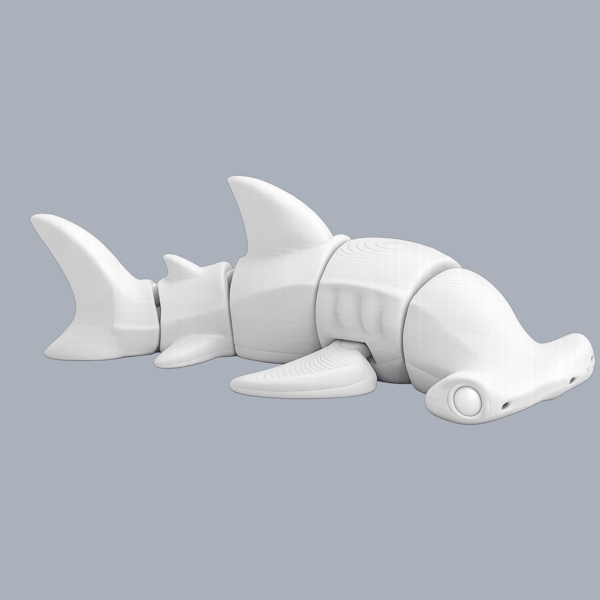 Paint-A-Flexi hammerhead shark model by Driftwood 3D Printworks, showcasing detailed, colorful 3D-printed shark design.