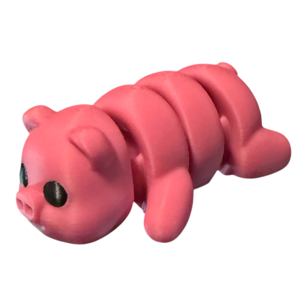 Driftwood 3D Printworks Flexi Pig toy, flexible plastic pig with detailed features, designed for playful kids and collectors